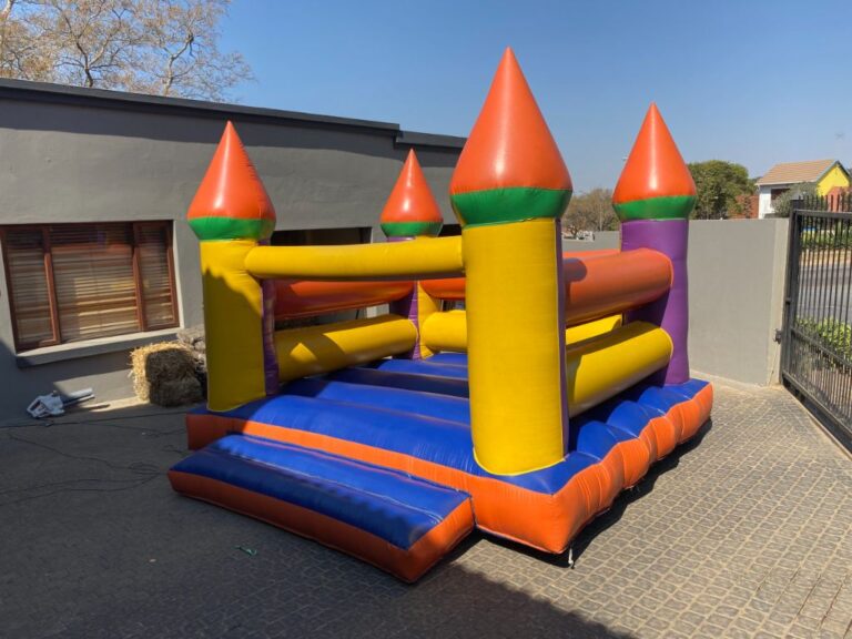 Small colorful castle bounce house for kids parties